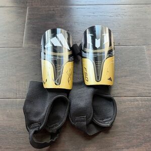 Adidas F50 Black and Gold Protective Gear